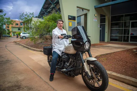 Alexander TEP Student on bike 