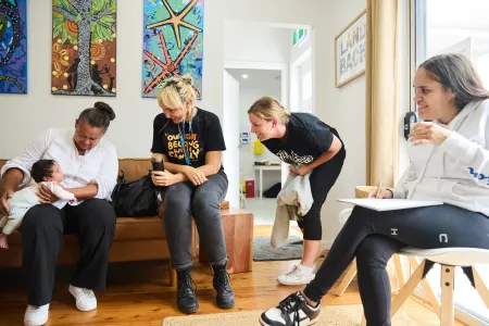Waminda's Birthing on Country team and mum Nekaya dote on baby Akarii at the Minga Gudjaga Gunyah mother and baby clinic in Nowra NSW.  Picture: Tace Stevens 