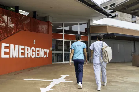 people walk into emergency department
