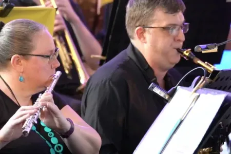 wind ensemble group playing instruments