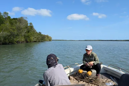 Two people on boat in a sea