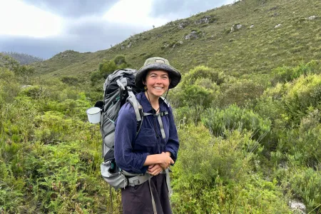 Portrait of Matilda Southgate hiking in a mountain landscape