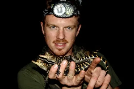 Mr Brien inspects American alligator hatchlings. Photo: Jemeema Brien.