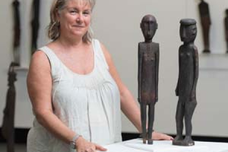 Curator Joanna Barrkman with some of the Sculptures of Atauro Island