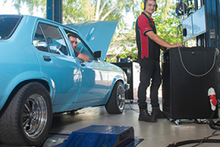 Light vehicle automotive students with the new dynamometer at Casuarina campus, from left: Tyrone Anderson and Kevin Bucher