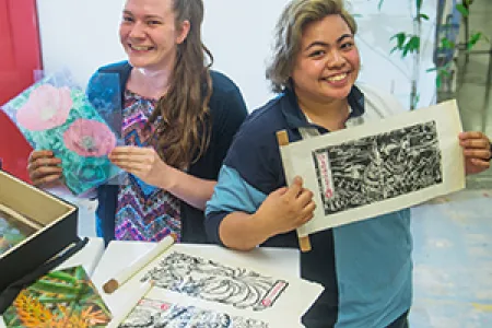 Visual arts students Kirstie Scullen (left) and Christine Barzaga will exhibit at the “Fledgling” exhibition on Friday