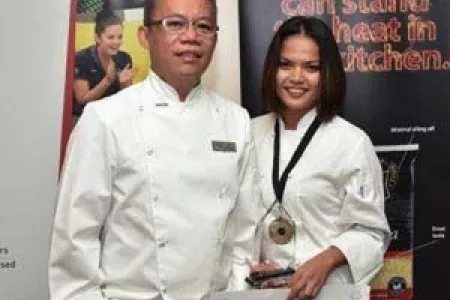 NT Australian Culinary Federation representative John Borlagdan and Champion First Year Apprentice Maria Hoad 