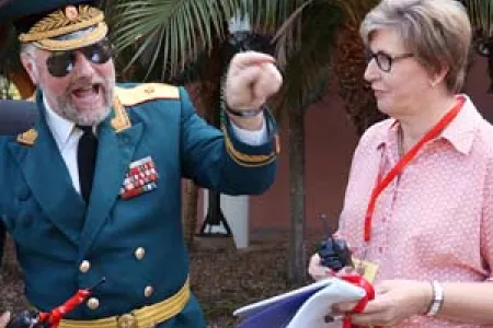 Brigadier from the Disaster Commission of Sebedoh RedR Dale Potter the provides logistical instructions to second year Bachelor of Humanitarian and Community Studies student Suzanne Kady as part of the simulation