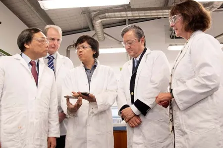 From left - INPEX Corporation CEO Takayuki Ueda, CDU Chancellor Paul Henderson, CDU researcher Dr Khanh Vin Nguyen, INPEX Australia President Director Hitoshi Okawa and acting Vice-Chancellor Professor Sue Carthew during a tour of CDU’s North Australian Oil and Gas Centre