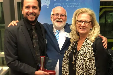 From left: Professor James Smith with conference delegate Brian O’Neill and colleague Sue Trinidad.