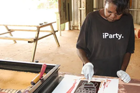 Seven North Australian artists learned printmaking and other artistic skills in the Vocational Education and Training course. Pictured: Selina Bundamura. Photographer: Andrew Barker, Kira Kiro Arts.