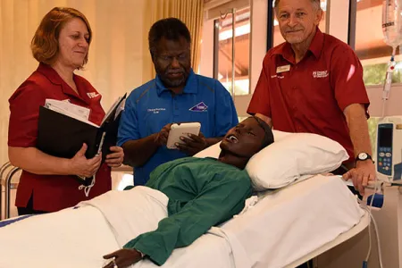 Nursing staff Robin Cross, Roland Pulagis and Dr Colin Watson pay a call on “Tiffany” the manikin in the lead up to this week’s simulation block.
