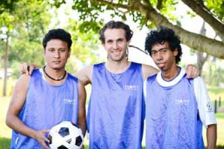 Jiwan Gajmer, Pat Sims and Bertanizo Guro are training together to participate in the Football Cup