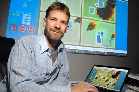 Rohan Fisher has developed an online simulation that allows landholders to visualise the impact of fuel load and weather on the spread of fire