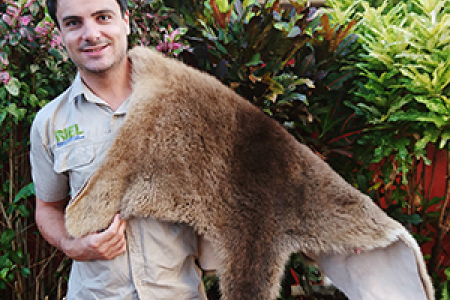 PhD candidate Stewart Pittard won a kangaroo pelt for Best Student Presentation at the conference