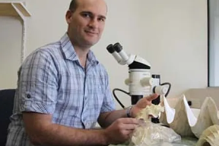 Dr Shane Penny will graduate at the CDU graduation ceremonies today