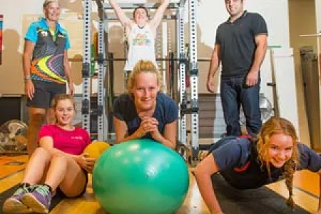 Back: Darwin swimming coach Clare Labowitch, swimmer Sam Bricknell and CDU lecturer in Exercise and Sports Science Dr Daniel Gahreman. Front: Swimmers Emily Williamson, Lauren McSkimming and Alice Milikins.
