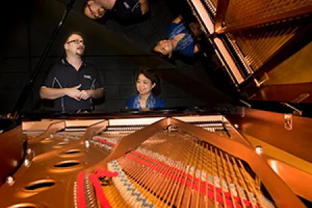 CDU piano lecturer Chen Hui – who will perform at the Stage Door Club – making music with Paolo Fabris.