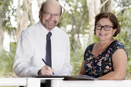 Charles Darwin University Vice-Chancellor Professor Simon Maddocks and Desert Knowledge Australia Chief Executive Officer Lauren Ganley at the Memorandum of Understanding signing 