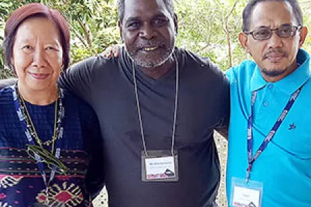 Expert fire trainer Otto Bulmaniya Campion (centre) with Ms Nurangesti Yulianingsih and Mr Iwan Subiantoro.