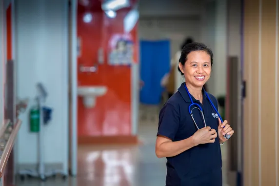 Nurse in hospital hallway
