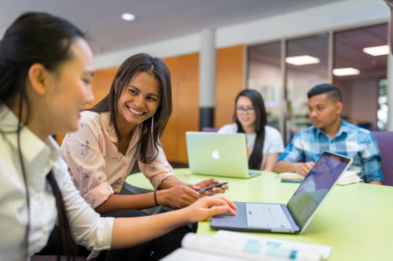 Students studying in library