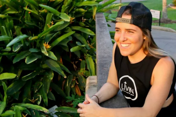 CDY Student Bridie  smiling in her LIVIN hat 