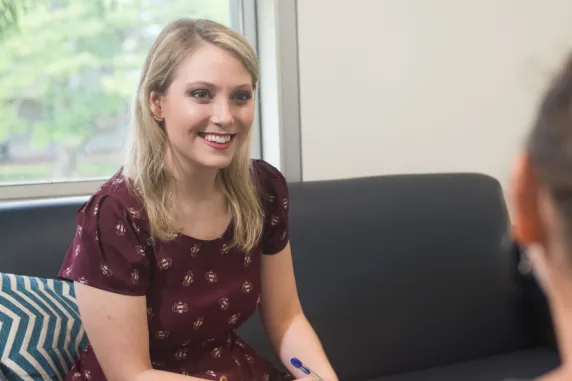 Female psychology, social work or counselling student working with a patient