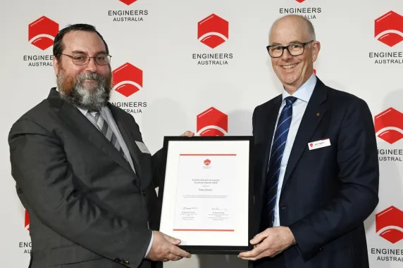 CDU engineering graduate Toby Snaire with award