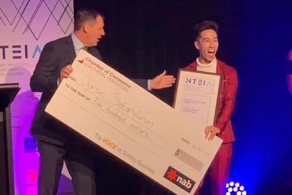 Alumni Awards finalist Jurse Salandanan winning an award