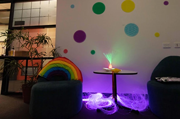 The special room features subdued lighting, complimentary colours, calming sounds and images of nature.