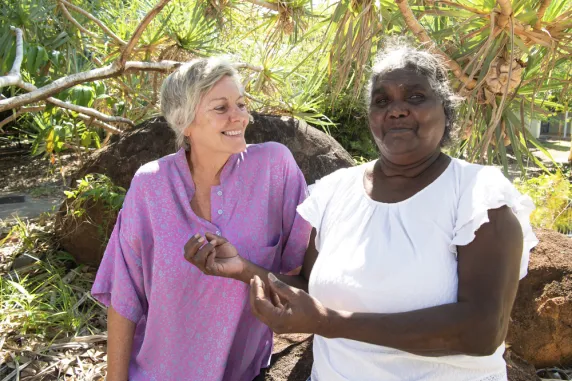 Anne Lowell and Elaine L Maypilama discussing project