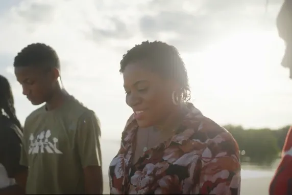 Cindy walking at sunset