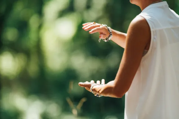 image of a woman's hands doing tai chi