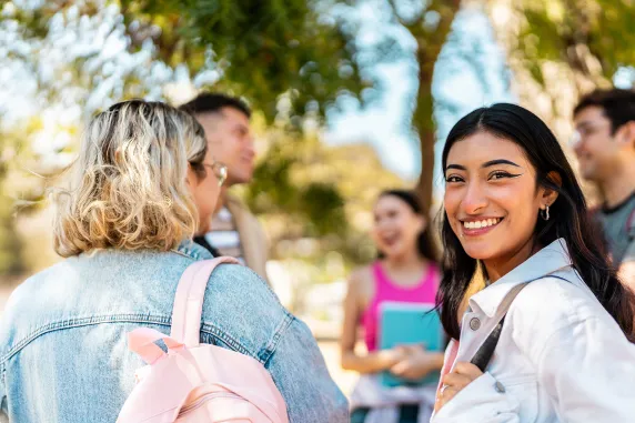 A group of students chatting happily
