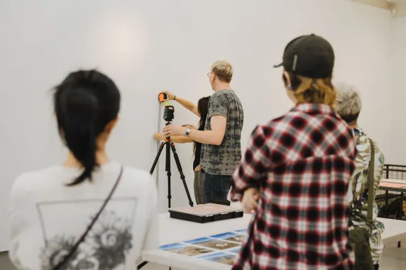 Students learning in the Nan Giese Gallery