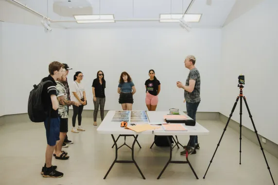 Students learning in the Nan Giese Gallery
