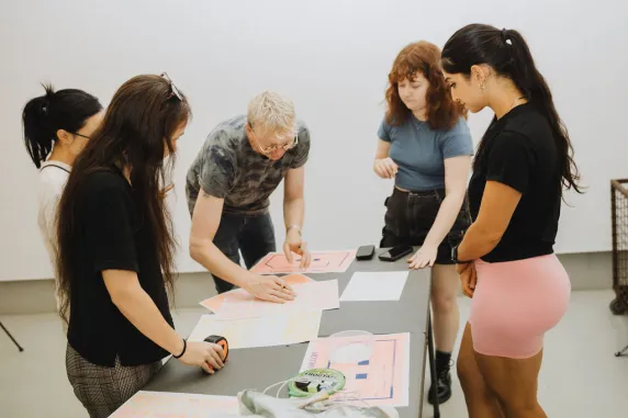 Students learning in the Nan Giese Gallery