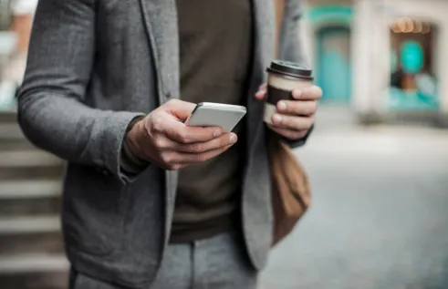 Man checking schedule on mobile