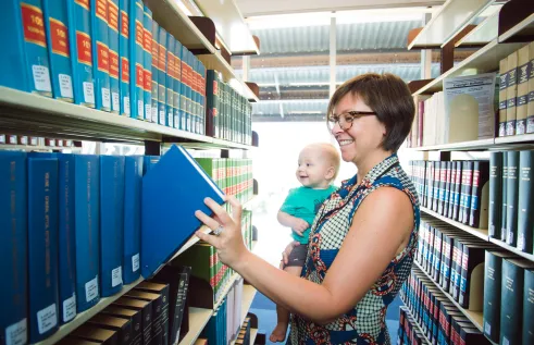 Parent in the library with a baby