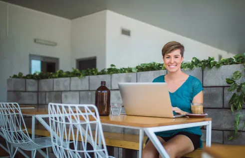 Student studying online in a cafe