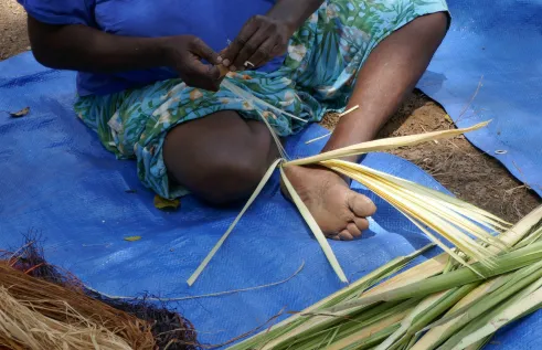 person sitting on mat
