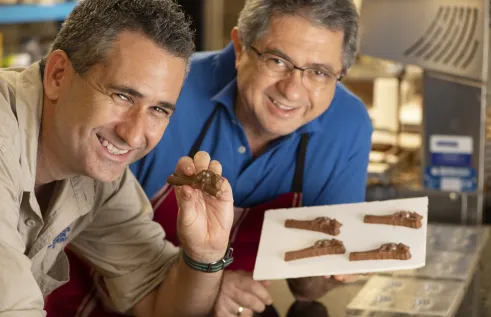 Brett Murphy and Leo Cleanthous with the new chocolate quolls