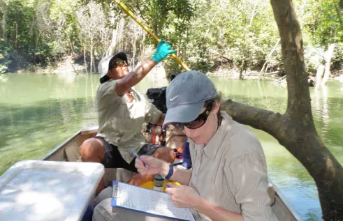 Dr Miriam Kaestli and DENR’s Mr Matthew Majid taking water samples in Darwin Harbour. 