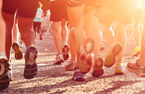 Image of a group of people running 