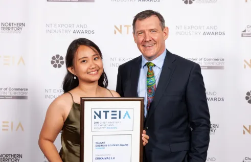 Erika accepting her award at the ceremony