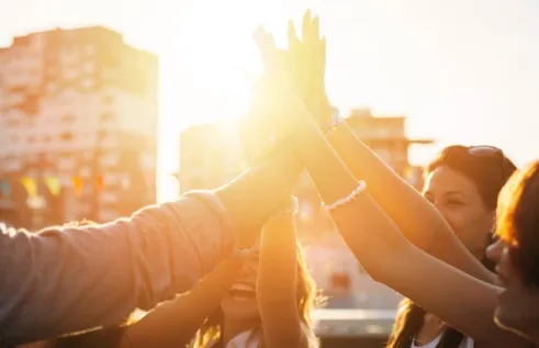 Students high fiving