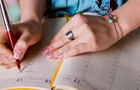CDU Student chantal works on a organisation spreadsheet 