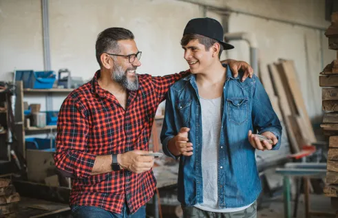 Father and teenage son having a friendly discussion