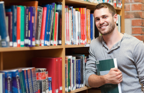 male student in a library